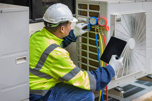 Professional Emergency Hvac technician working in Byfield, MA